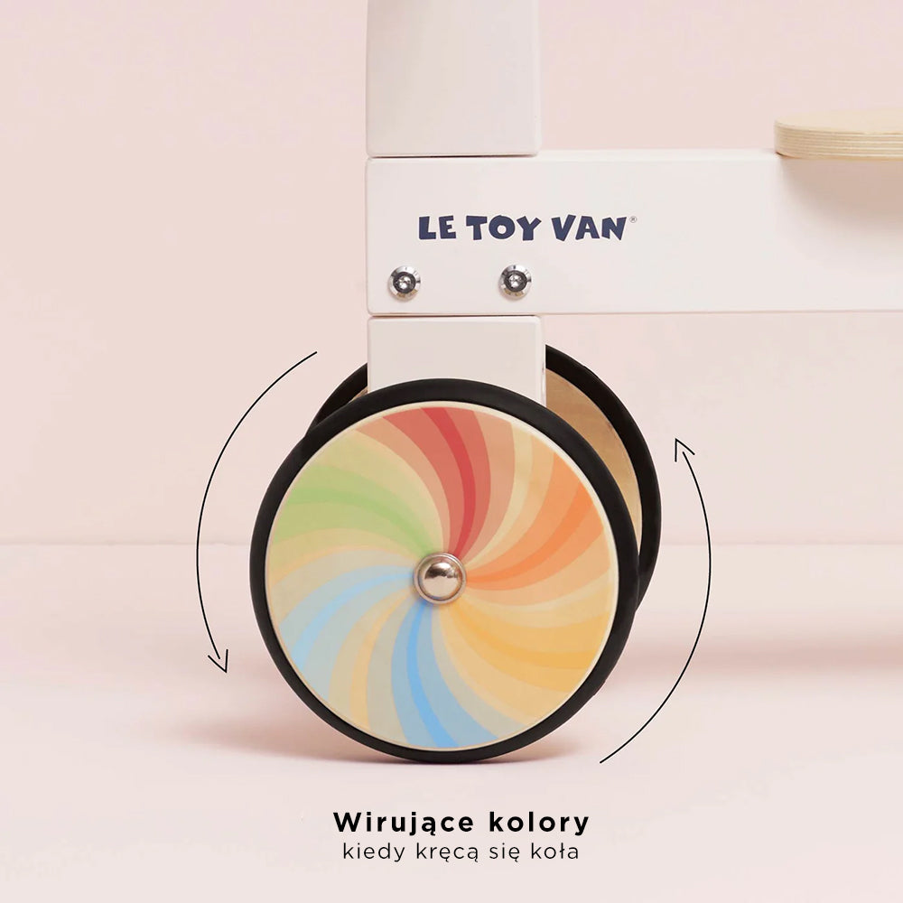Tęczowy pierwszy jeździk, drewniana zabawka na kołach dla dzieci Le Toy Van