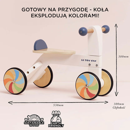 Tęczowy pierwszy jeździk, drewniana zabawka na kołach dla dzieci Le Toy Van